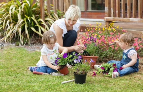 Gardener preparing a transparent quote for a front garden in The Hyde