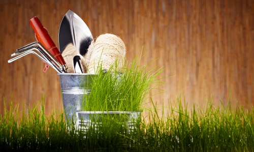 Seasonal garden maintenance in The Hyde with leaf clearing